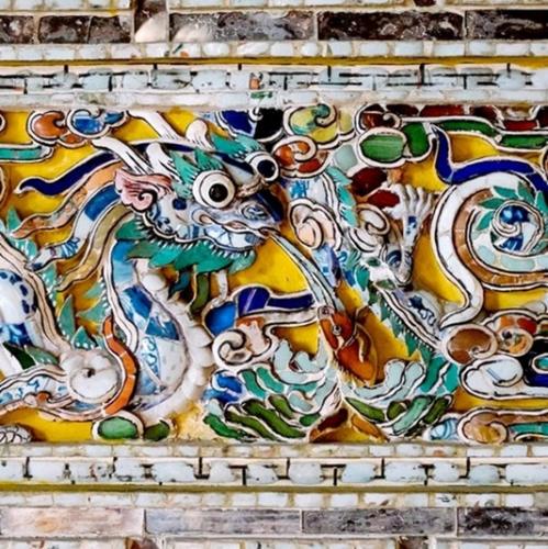 Elaborate mosaic art in Hue.
